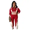 Td2789 Ropa Femenina Transfronteriza Europea y Americana Otoño e Invierno Nuevo Conjunto de Dos Piezas con Top de Cuello Alto con Cremallera y Pantalones Largos de Bloques de Color para Mujer