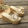 Nuevas sandalias de cuña de verano multicolor con lazo transfronterizo para mujer de talla grande, zapatillas elegantes de punta redonda con suela gruesa