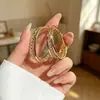 Argolas de orelha de moda de luxo leve, argolas versáteis de temperamento, personalidade, brincos da moda de celebridade da internet, brincos pequenos requintados, atacado, dourado