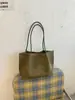 Bolso de mano tejido de diseño de nicho transfronterizo para mujer, nuevo estilo 2026, con temperamento, casual, gran capacidad, para el trabajo, de un solo hombro, para llevar debajo del brazo