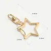 Fornecimento spot de fábrica fivela de metal estrela de cinco pontas pulseira fivela rotativa em forma de 8 chaveiro anel acessórios fivela de boneca DIY ornamentos