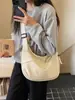 Bolsa de tela de gran capacidad para niñas, nueva bolsa de hombro cruzada de diseño casual niche estilo coreano, bolsa de albóndiga de alta gama