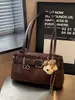 Bolso de hombro retro de diseño de nicho transfronterizo para mujer, nuevo modelo Otoño 2026, bolso de hombro de moda estilo coreano para commuting con textura