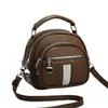 Bolso de mujer 2026 nuevo modelo multibolsillos con cremallera, bolso de mano redondo pequeño, simple y versátil para ir al trabajo, bolso de hombro y cruzado
