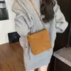 Bolso francés de gamuza para mujer de otoño e invierno, nuevo bolso de hombro retro de moda 2026, bolso cruzado versátil para teléfono