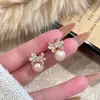 Brincos de Zircônia Vermelha com Laço 2026 Novos Brincos de Clipe Tendência Brincos de Luxo Estilo Nicho Brincos de Pérola