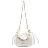 Bolso pequeño tipo cubo con cadena de patrón de rombos estilo Chanel para mujer, nuevo modelo 2026, bolso tote de gran capacidad, bolso de hombro y bolso cruzado para ir al trabajo