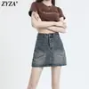 Saia Jeans Curta Retrô Feminina Tendência Verão 2025 Nova Saia de Cintura Alta no Quadril Saia Evasê Anti-Exposição