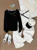 Camiseta básica de color liso estilo coreano con cuello a color y bordado de corazón, nueva colección otoño 2026, holgada, casual, de cuello redondo, manga larga