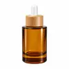 Stock Listo del Fabricante 50ml100ml Botella Cilíndrica de Fondo Grueso Botella para Sub-Embotellado de Cosméticos Esencia de Rocío Puro Hidratante