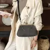 Bolsa de ombro nova moda outono 2026 transfronteiriça, bolsa transversal versátil e simples com corrente, bolsa de mão estilo clutch