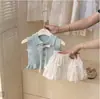 Verano 2026 Elegante Conjunto Nuevo Calado Chaleco de Punto Falda Floral para Bebé Niña Conjunto de Dos Piezas a la Moda