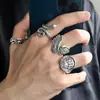 Transfronterizo Nuevo Europeo y Americano Retro Alas de Serpiente Calavera Mano Hueca Juego de 4 Piezas Joyería de Mano Anillo Listo para la Venta