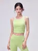 Top de yoga para mujer con cintura plisada, copas fijas que se mantienen en su lugar, elegante diseño de bloques de color y espalda cruzada