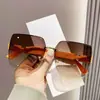 2025 Nuevas Gafas de Sol sin Marco Degradado de Dos Tonos de Alta Gama para Conducir Mujer Moda Tendencia Gafas de Sol de Celebridad de Internet Douyin