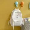 Mochila feminina macia e fofa na cor creme, simples e versátil, pequena mochila fofa de desenho animado, mochila escolar, mochila