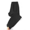 Los pantalones de chándal Huamian son modernos y están de moda para otoño e invierno.. Los pantalones de chándal Huamian para hombre son cómodos y holgados. Venta al por mayor de pantalones de chándal Huamian