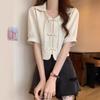 Camisa blanca retro con botones pequeños, nueva llegada de verano, para mujer, diseño de top con mangas abullonadas, camisa francesa de manga corta de nicho