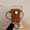 Bolsa de celular versátil de moda outono 2026 transfronteiriça para mulheres, bolsa de ombro fofa de nicho, bolsa transversal de pelúcia
