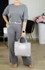 Conjunto de 3 Piezas para Mujer 2026 Sitio Independiente Transfronterizo Europeo y Americano Top de Manga Larga, Cinturón y Pantalones