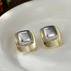 Pendientes cuadrados de metal con diseño de aguja de plata S925, ligeros, de lujo, con un toque atmosférico de alta calidad, para mujer, nuevos pendientes 2025, para uso diario.