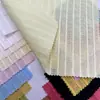 Nueva colección de primavera y verano: tejido jacquard a rayas 100% algodón teñido en hilo con tacto texturizado, adecuado para vestidos de niños y mujeres, y tejido plano
