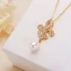 Joyería al por mayor de Zhuji Lujo ligero Nicho Sentido de alta gama Cadena para clavícula Completamente de diamantes Moda Versátil Collar con colgante de perla de agua dulce