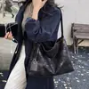 Bolsa tote estampada retrô para mulheres, nova coleção 2026, de alta qualidade, leve e estilosa, adequada para o uso diário e para ir ao trabalho.