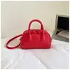 Bolsa de boliche rosa claro estilo doce para mulheres, nova bolsa de mão texturizada de nicho para o verão de 2026, bolsa de corrente para o trabalho