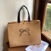 Loja de roupas de celebridade da internet bolsa de mão não tecido logotipo personalizado roupas compras presente bolsa atacado