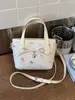 Bolsa Grande Estampada Estilo Dulce y Femenino para Mujer 2026 Nueva Bolsa de Hombro Grande de Gran Capacidad para el Trabajo Versátil Casual