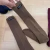 Calcetines de Compresión para Pantorrilla Ioulor Nuevos de Otoño e Invierno con Letras Casuales de Color Sólido Aeróbicos para Mujer Calcetines de Compresión para Pantorrilla para Ropa Exterior