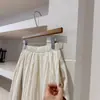 Falda de retazos de color beige, diseño delicado, texturizada, de cintura alta, longitud media, para mujer, nuevo modelo Primavera 2026