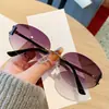 Novedad Gafas de Sol Sin Marco para Mujer Gama Alta Retro Modernas Versátiles Gafas de Sol con Protección Solar Montura Ovalada Gafas de Sol Metálicas Curvas