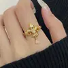 Nuevo Anillo Colgante de Flor de Iris Cruzada con Circonita de Estilo Minimalista Retro de Nicho para Mujer, Anillo Abierto Versátil de Gama Alta para Mujer
