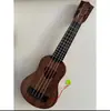 Ukelele para niños guitarra pequeña puede tocar grande, mediano y pequeño simulación niños y niñas Instrumentos musicales y juguetes para bebés al por mayor