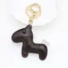 Colgante original de caballo lindo para el Año del Caballo, muñeca de cuero estilo miu en colores macarrón, dijes para bolso al por mayor