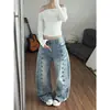 Jeans transfronterizos estilo americano inspirados en Napoleón para mujer, con un nuevo diseño con hebillas metálicas, un look único y elegante, y una silueta holgada, de pierna ancha y corte curvo.