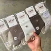 Calcetines Nuevos de Media Pantorrilla para Otoño e Invierno, Calcetines Deportivos, Letras Color Café Gracia, Mismo Color, Cómodos y Transpirables, Venta al por Mayor por Fabricante