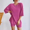 Traje de dos piezas de punto casual de color liso para mujer, de moda, transfronterizo europeo y americano, nuevo 2024, verano, cuello redondo, holgado