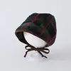 Gorro de estilo coreano para bebés y niños pequeños, sombrero moderno y versátil que cubre las orejas, nuevo sombrero retro de cuadros grandes para otoño/invierno para bebés