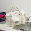 Bolsa de viaje de alta calidad y gran capacidad para mujer, nuevo estilo 2026, adecuada para llevar equipaje, al gimnasio, a la natación y como bolsa de maternidad de gran capacidad