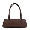 Bolsa de axila retrô francesa de nicho para mulheres, bolsa baguette versátil de luxo leve para o início do outono, bolsa de mão e bolsa de ombro para o dia a dia.