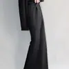 Pantalones de vestir casuales negros holgados y fluidos con forro de polar para otoño e invierno, modernos y duraderos, ligeramente acampanados, de longitud extendida