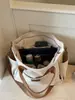 2026 Bolso de Tela de Moda Nuevo Estilo Coreano Gran Capacidad Multifuncional Bolso Tote para Niñas Bolso de Mano Transfronterizo Vintage Bolso de Hombro