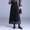 Falda midi plisada taiwanesa con una textura distintiva, nuevo estilo otoño/invierno 2026, con efecto de caída, elegancia veraniega, longitud media