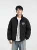 Chaqueta de algodón para hombre con cuello mao, corte holgado, nuevo estilo invierno 2026, simple y versátil, con un toque de alta gama, sin capucha, proporcionando calidez