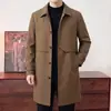 Suministro directo de fábrica gabardina larga para hombre con solapa, abrigo cortavientos de un solo botón para hombre casual de negocios de primavera y otoño, prenda exterior de moda