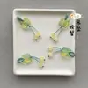 Precio mayorista directo de fábrica pulsera hecha a mano pulsera con colgante diy accesorios pequeños deslizantes colgante de garra de gato lindo Joker