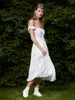 Vestido Jacquard Cruzado Hombros Descubiertos Estilo Europeo y Americano Verano 2026 Nuevo Bordado Hueco Francés Ajustado Vestido Largo Floral